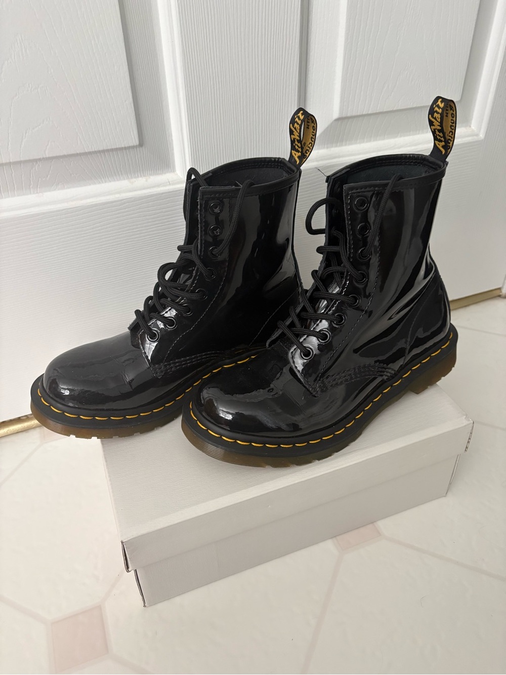 Dr. Martens Black Patent Leather Lace-Up Boots with Yellow Stitching